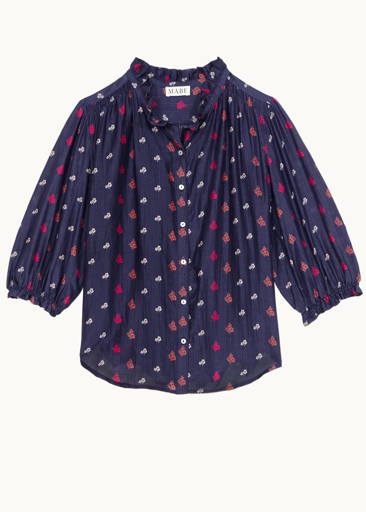 Navy blue blouse with red and white floral pattern on a white background