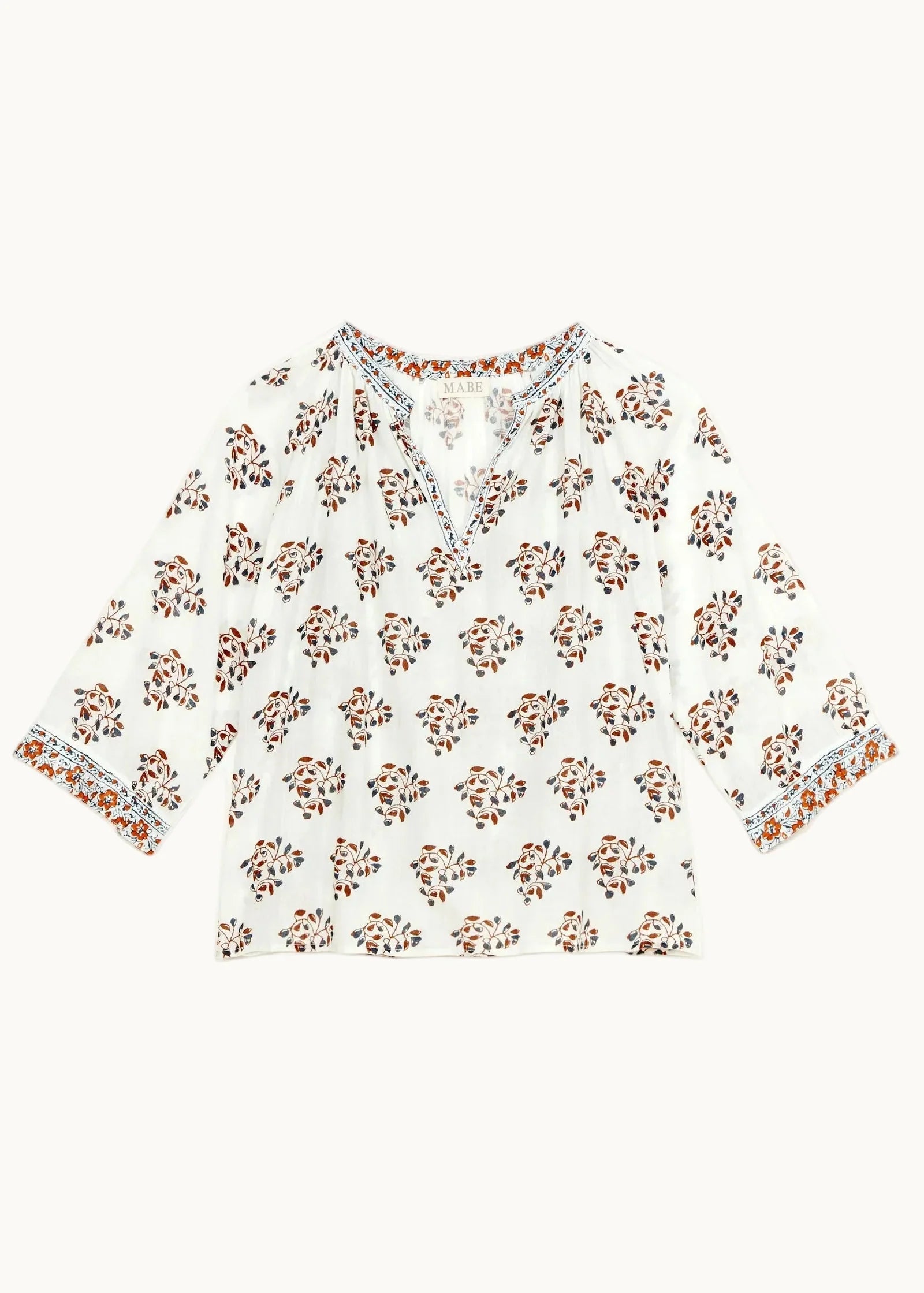 Floral-patterned top on a white background