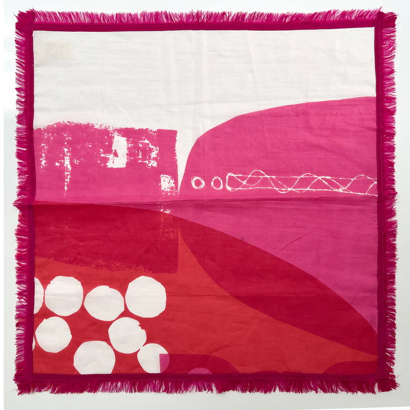 Picture of pink, red and white polkadot square scarf. Laid flat.