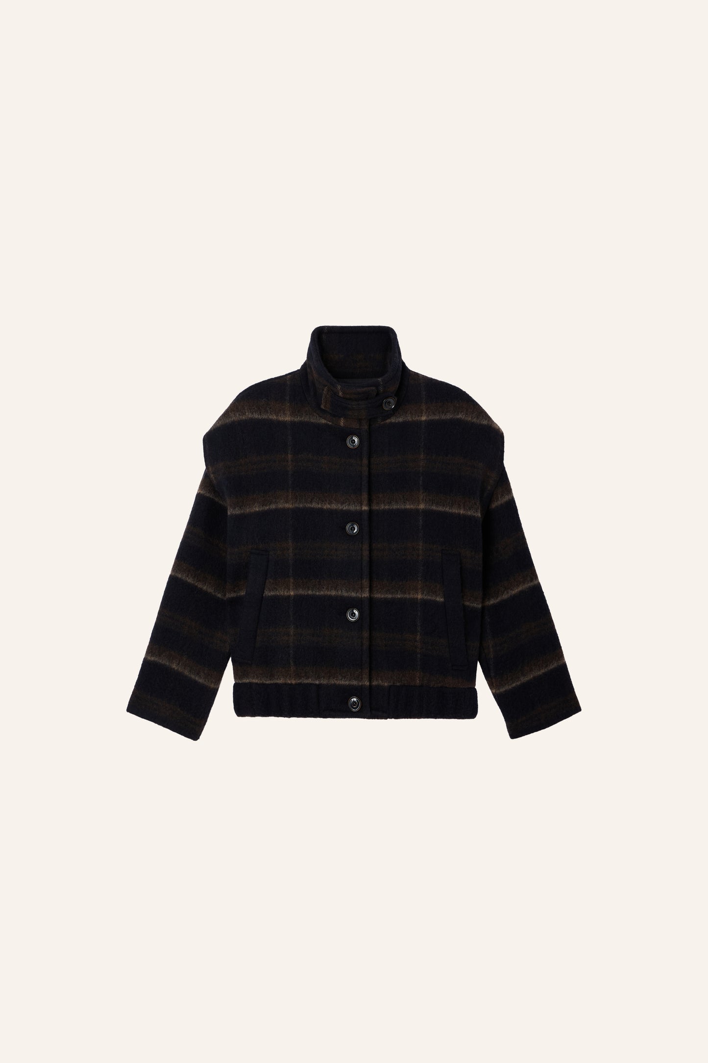 Product shot of a dark navy and brown plaid button-up jacket with a high ribbed turtleneck collar, paired with dark gray jeans and a brown shoulder bag, against a plain light gray background