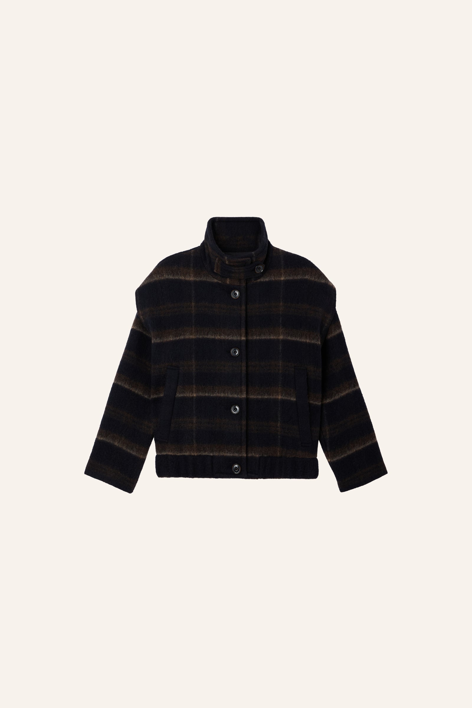 Product shot of a dark navy and brown plaid button-up jacket with a high ribbed turtleneck collar, paired with dark gray jeans and a brown shoulder bag, against a plain light gray background