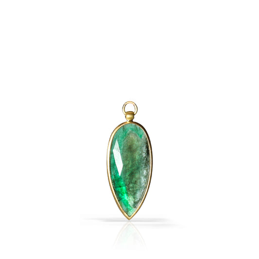 A teardrop-shaped green gemstone pendant with a gold bezel and loop, shown on a clean white background with a soft reflection below.