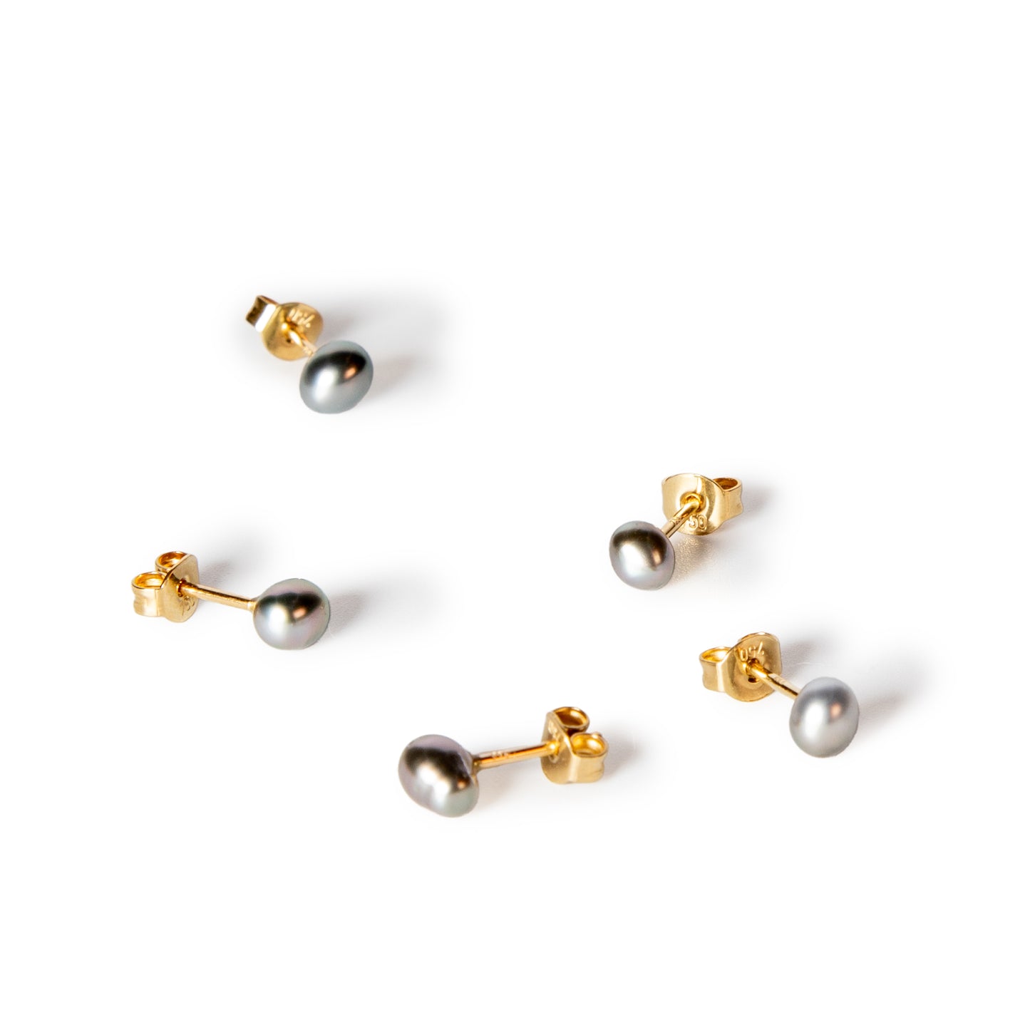 group of five tiny grey keshi pearl post earrings