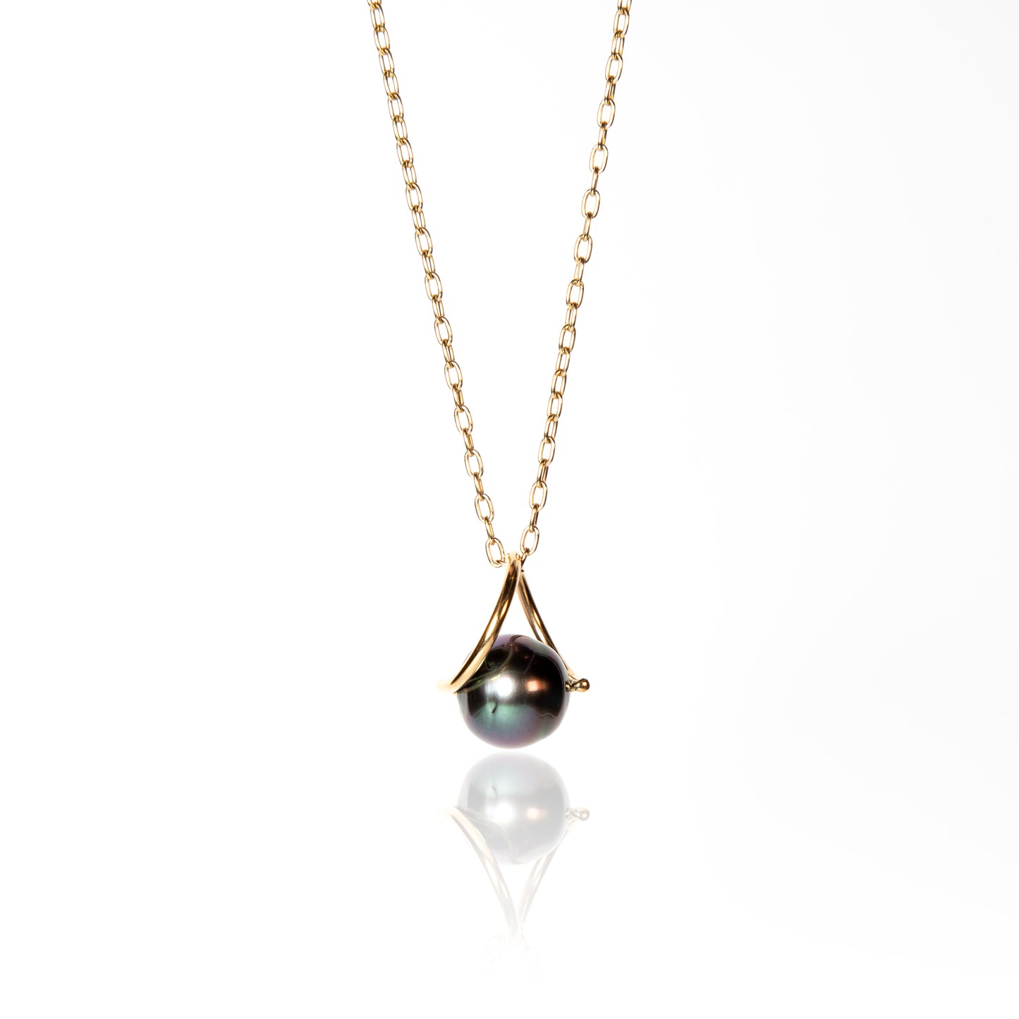 Green Tahitian pearl with gold twist setting on 18k yellow gold chain 