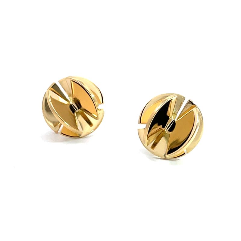 A pair of gold-toned geometric stud earrings with a circular, segmented design, displayed on a clean white background.
