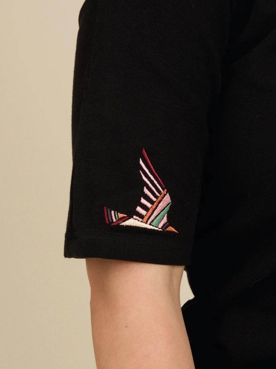 Detail of embroidery on t-shirt