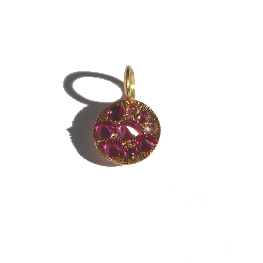 Round disc pendant charm with rubies and sapphires