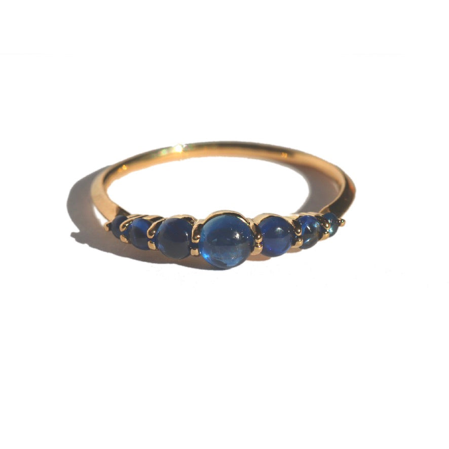 18k yellow gold ring with seven cabochon blue sapphires