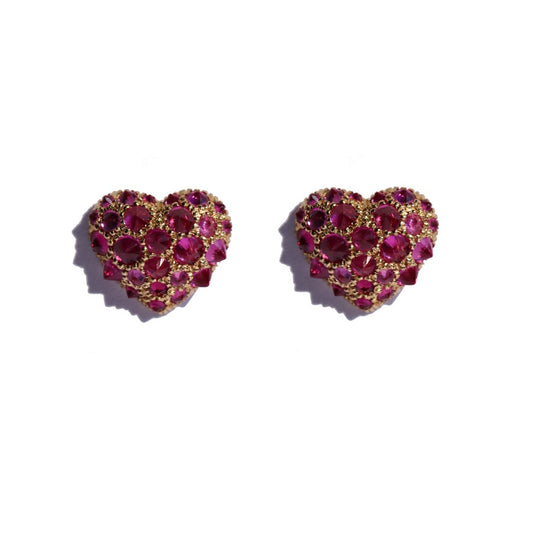 heart shaped stud earrings set with spiked rubies