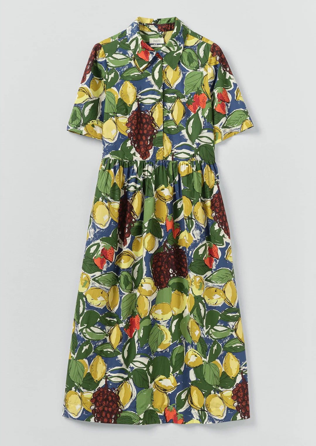 Dress with fruit pattern on a light gray background