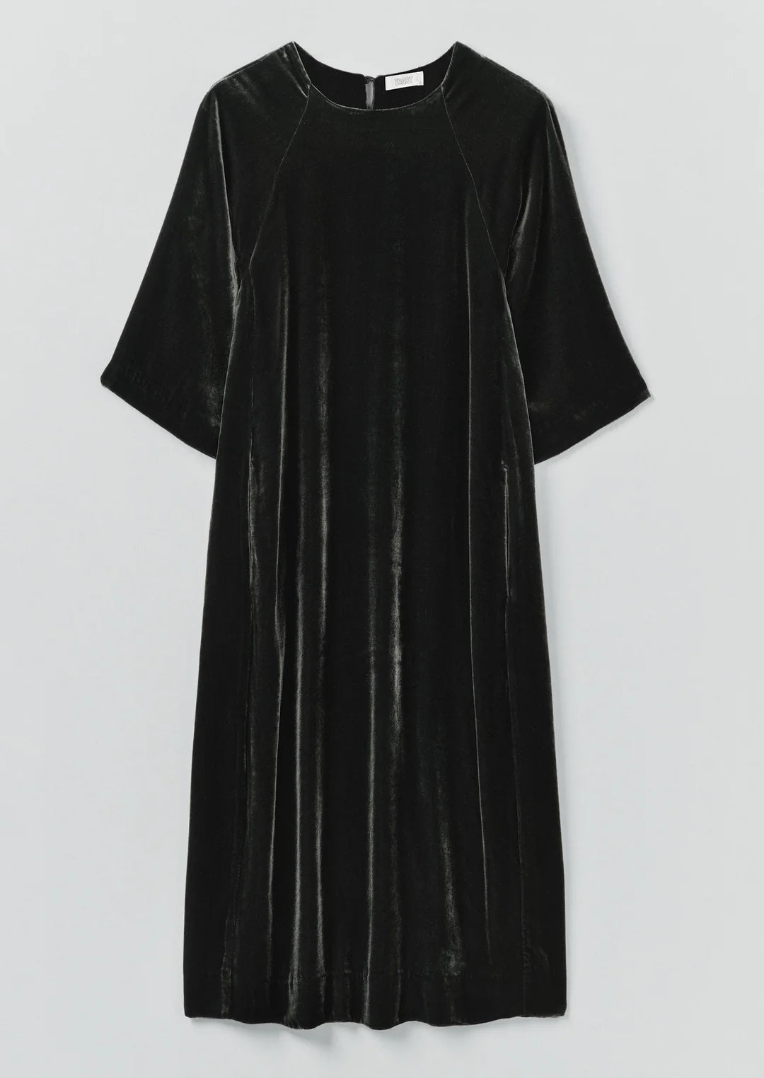 Black velvet dress on a light gray background