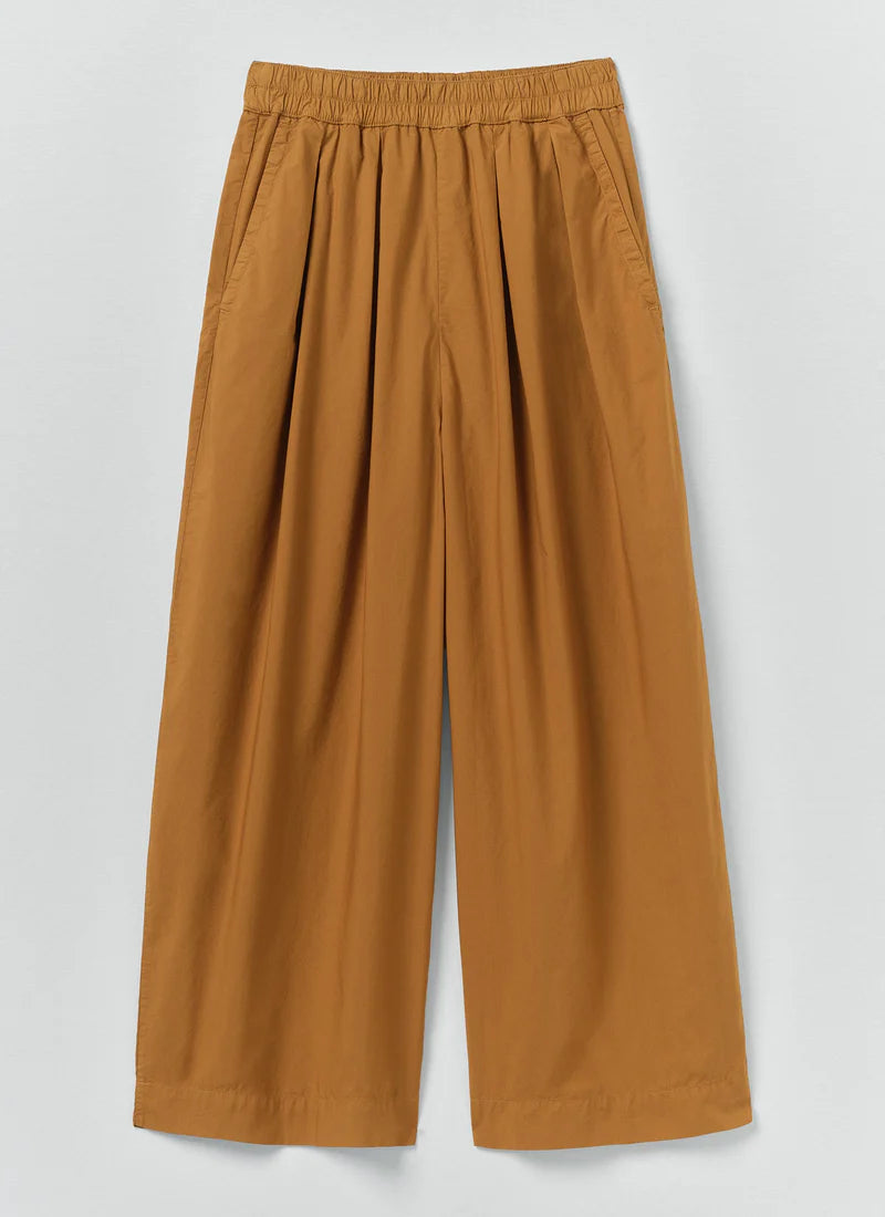 Brown pants on a light gray background
