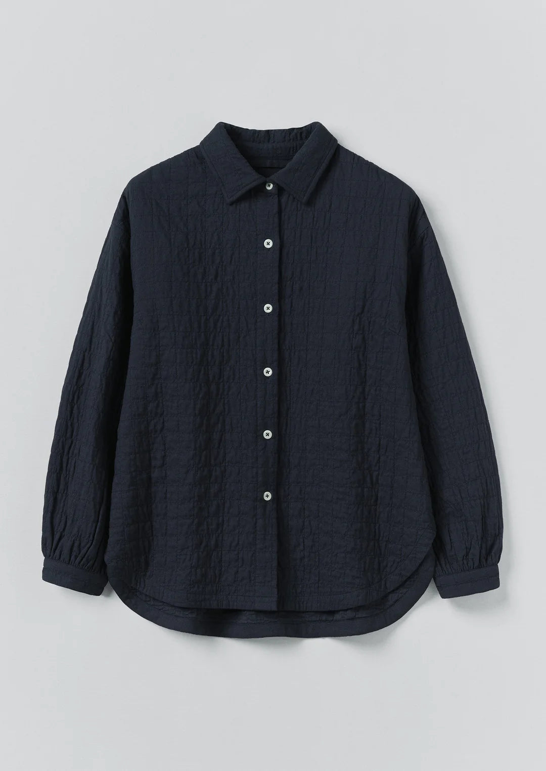 Dark blue button-up shirt on a light gray background