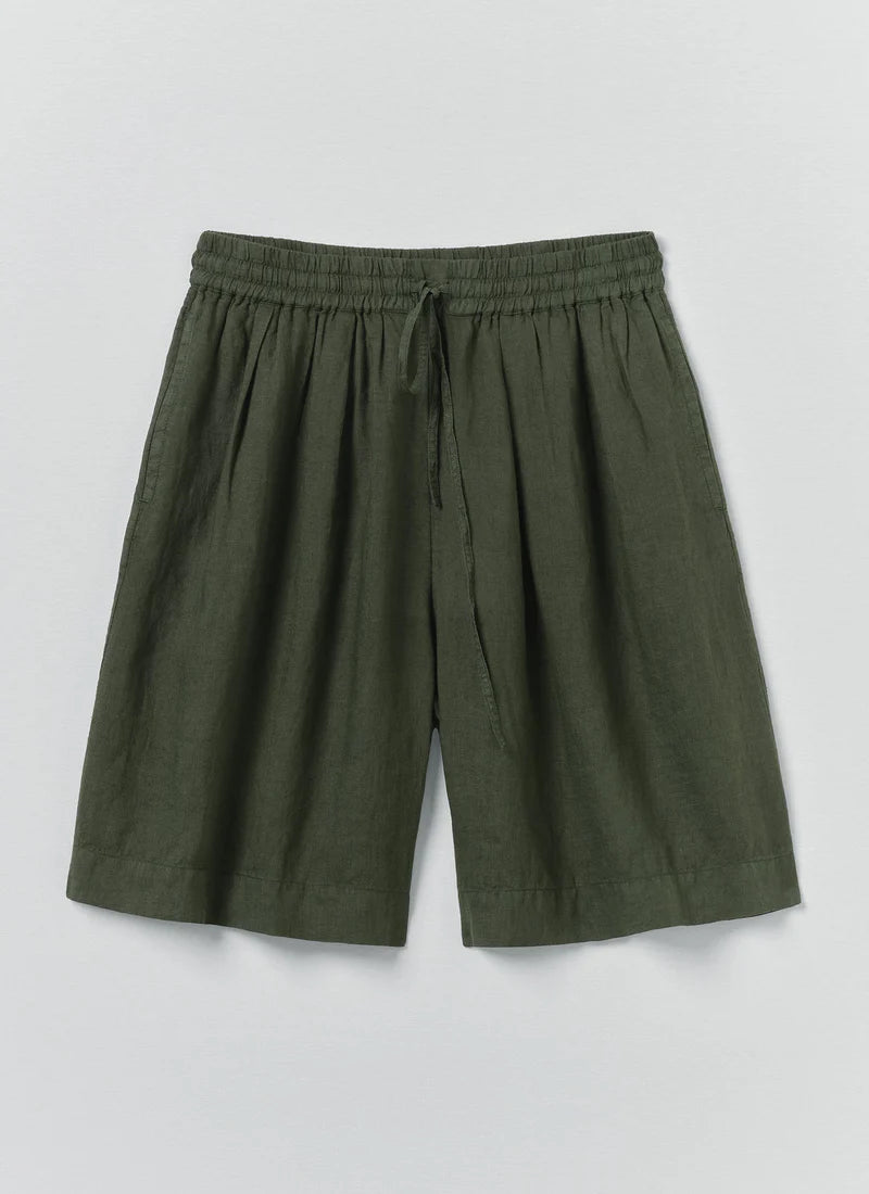 Green shorts on a light gray background