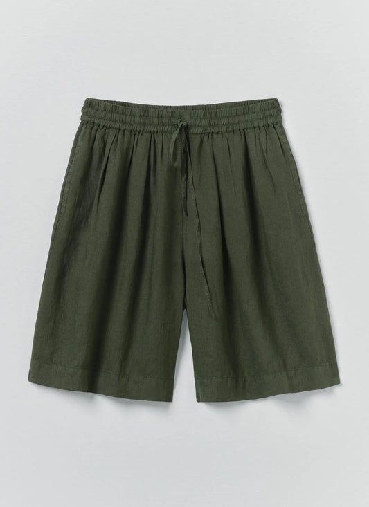 Green shorts on a light gray background