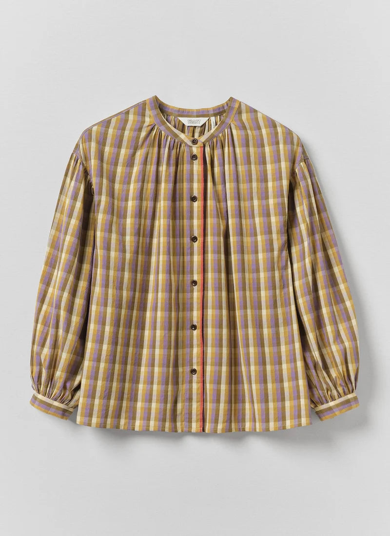 A photo of a check top with yellows, greens, and purples.