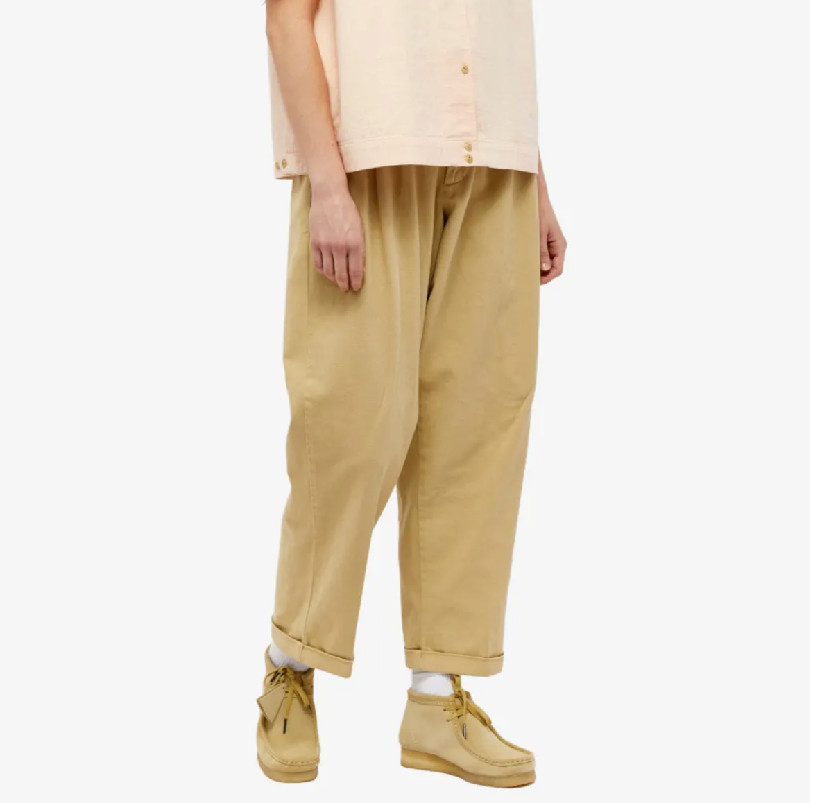 person wearing baggy sand colored pants