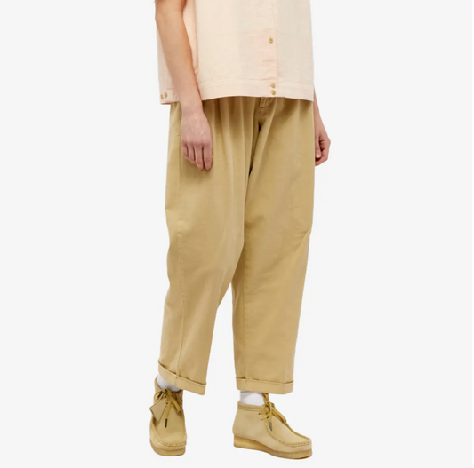 person wearing baggy sand colored pants