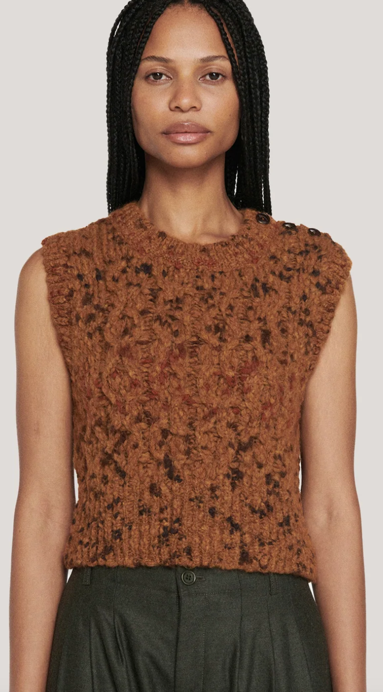 Front view showing mottled contrast knit. Cropped to pant waistline