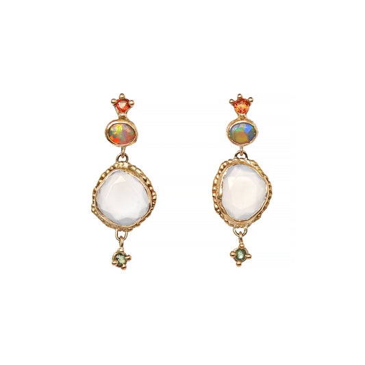 A pair of yellow gold earrings with black opals, sapphires, and chalcedony.