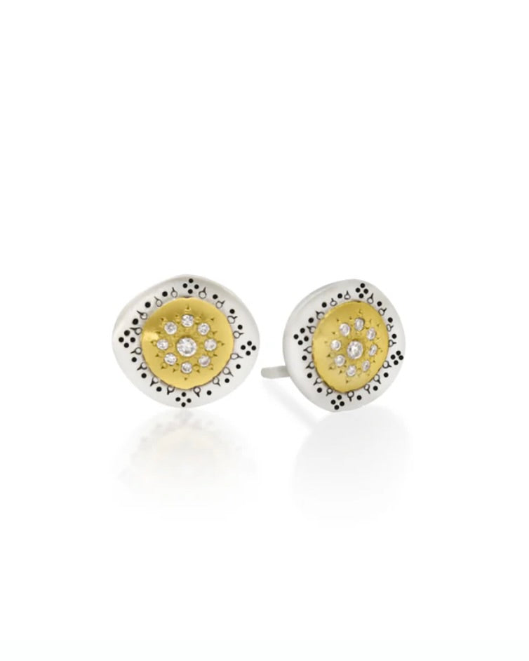 Tiny gold and silver stud earrings with diamonds