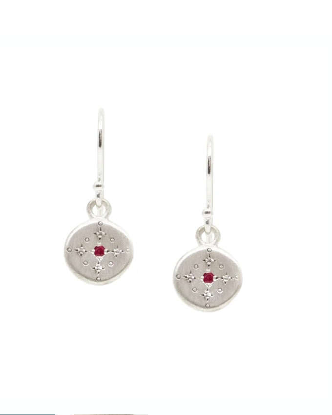 Small silver drop earrings with a tiny central ruby in each