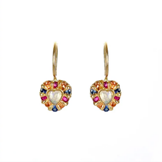 Heart-shaped earrings with colorful gemstones on a white background