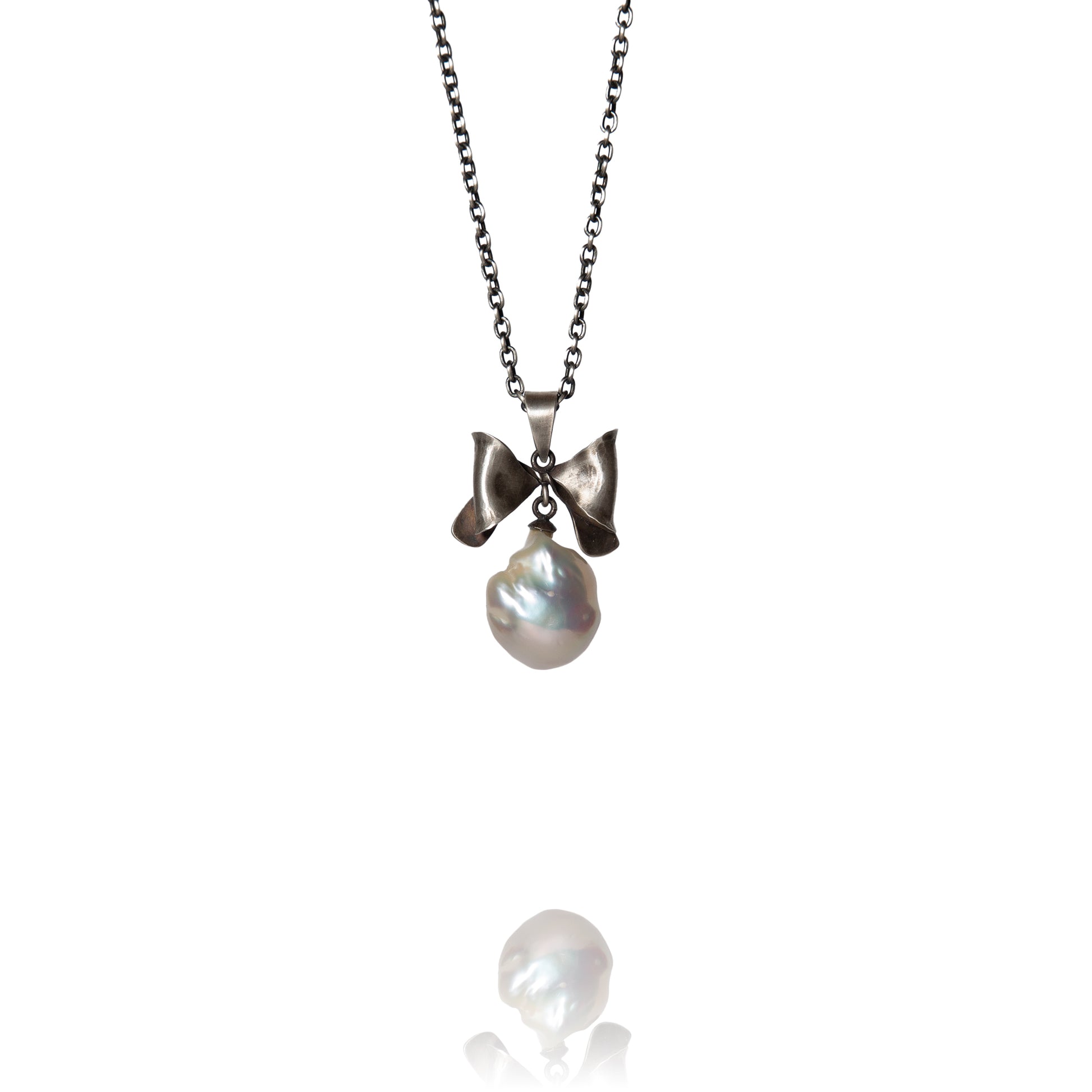 Oxidized sterling silver bow necklace with baroque pearl