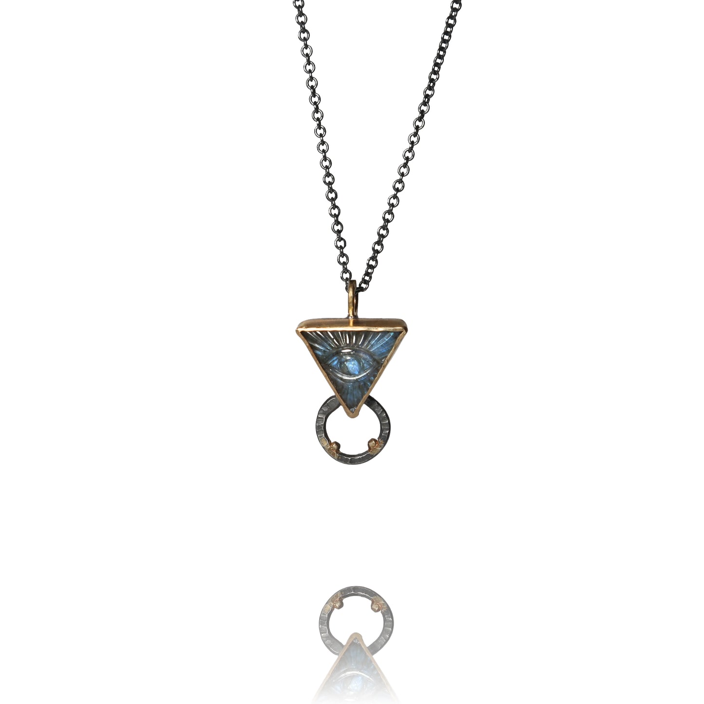 Triangular mason eye pendant on oxidized silver chain