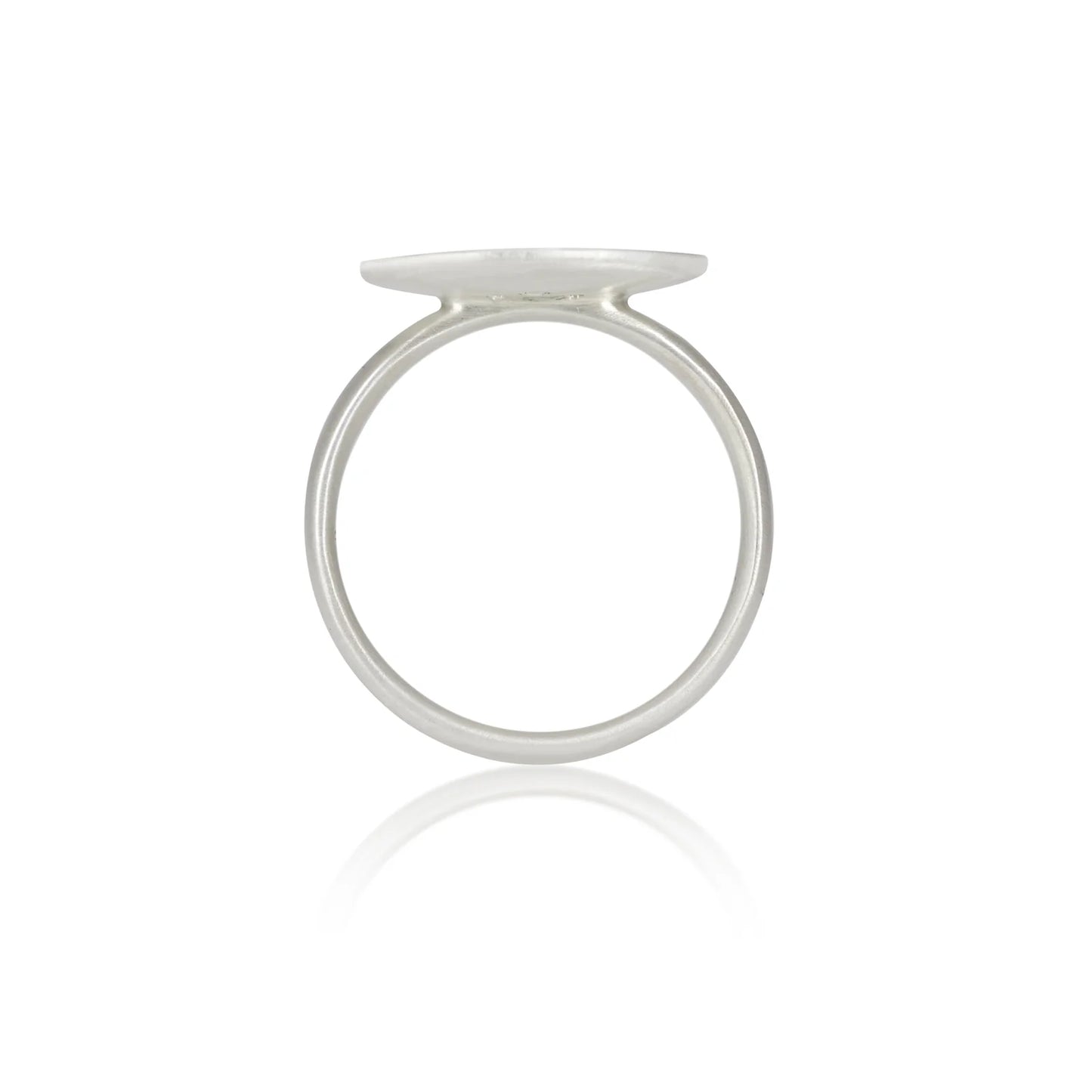 Silver ring with a flat top on a white background