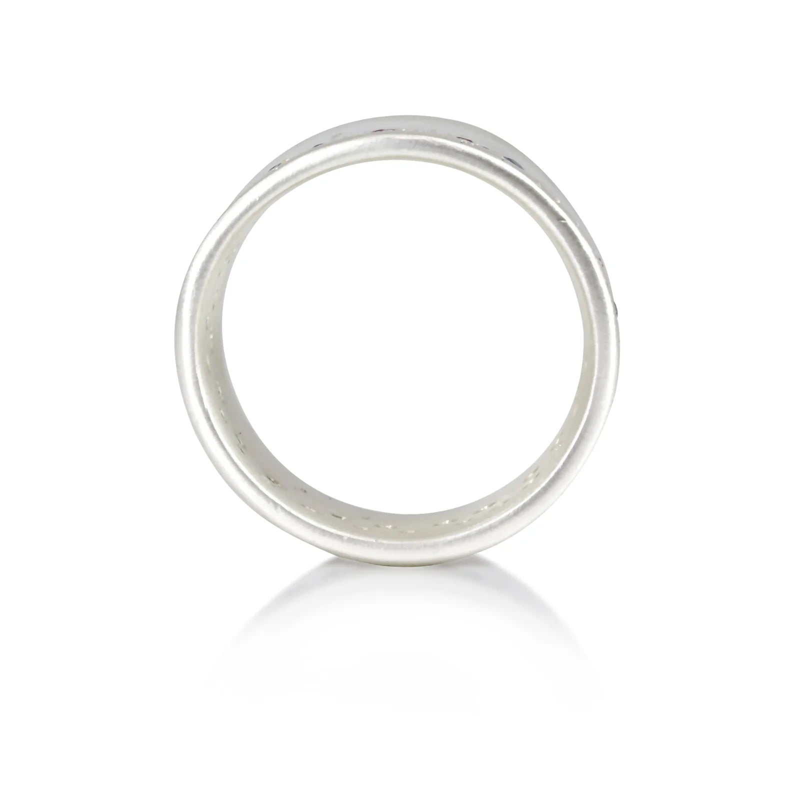 Side view of wide band silver ring